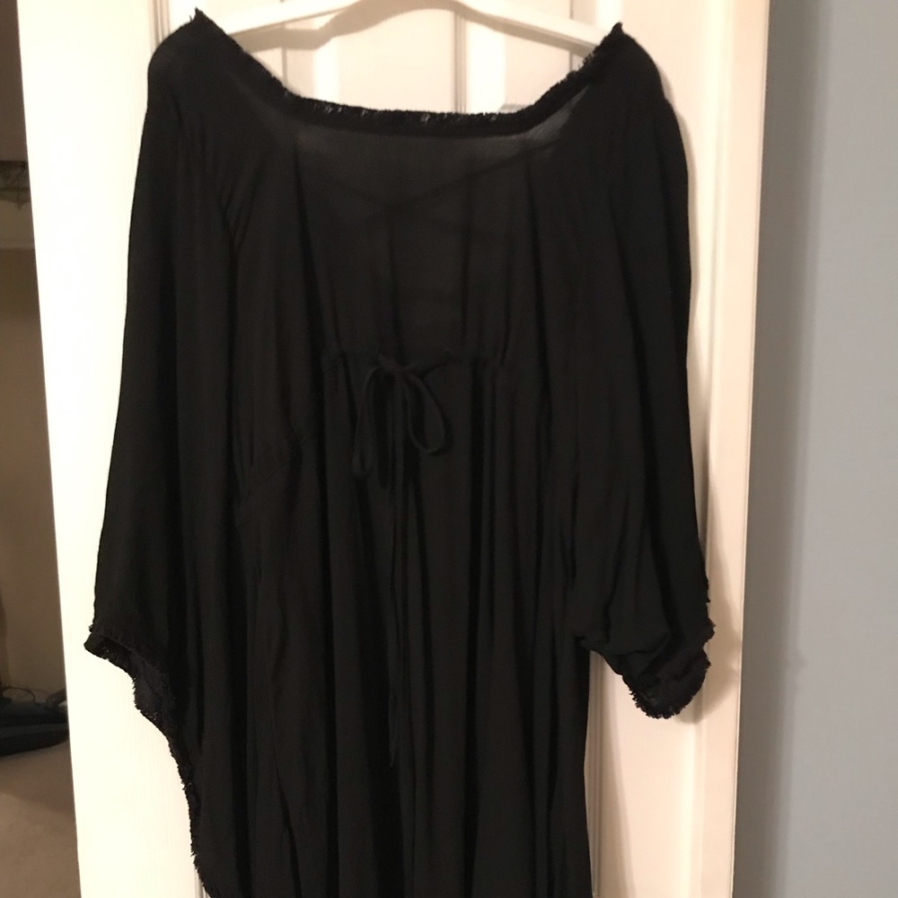 Black gauzy batwing dress